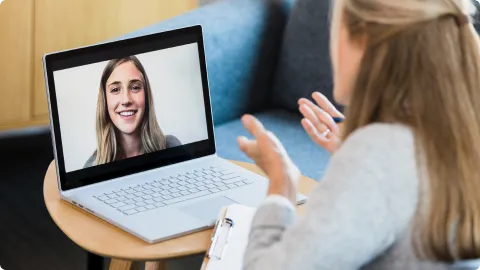 Picture of Neurofeedback Provider talking to a client on a remote session