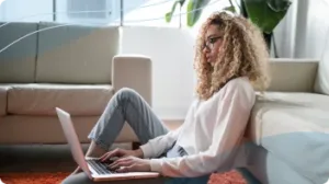 Woman on laptop taking BCIA course